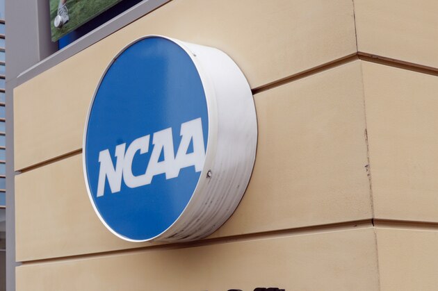 The national office of the NCAA in Indianapolis is shown Thursday, March 12, 2020. The NCAA canceled the men's and women's Division I basketball tournaments amid coronavirus fears on Thursday. (AP Photo/Michael Conroy)