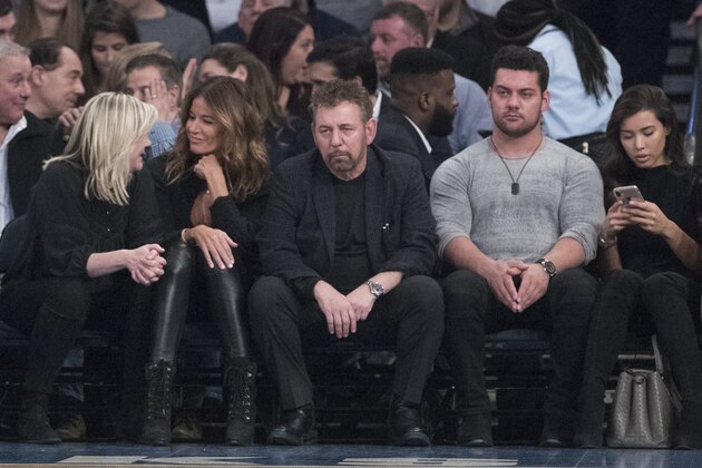 Madison Square Garden chairman James Dolan, center, watches the game action during the first half of an NBA basketball game between the New York Knicks and the Boston Celtics, Friday, Feb. 1, 2019, at Madison Square Garden in New York. (AP Photo/Mary Altaffer)