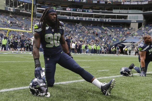 Seattle Seahawks defensive end Jadeveon Clowney stretches before an NFL football game against the Cincinnati Bengals, Sunday, Sept. 8, 2019, in Seattle. (AP Photo/John Froschauer) Seattle Seahawks defensive end Jadeveon Clowney stretches before an NFL football game against the Cincinnati Bengals, Sunday, Sept. 8, 2019, in Seattle. (AP Photo/John Froschauer)
