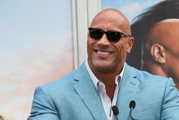 HOLLYWOOD, CALIFORNIA - DECEMBER 10: Dwayne Johnson attends a Hand and Footprint ceremony honoring Kevin Hart at the TCL Chinese Theatre IMAX on December 10, 2019 in Hollywood, California. (Photo by Jean Baptiste Lacroix/Getty Images)
