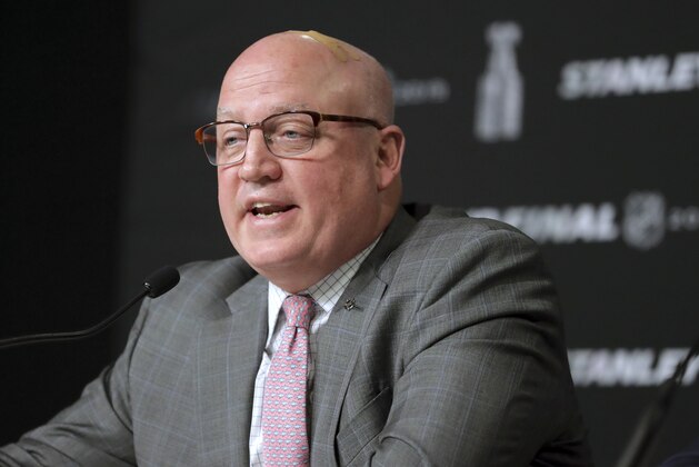 NHL Deputy Commissioner Bill Daly speaks to the media before Game 1 of the NHL hockey Stanley Cup Final between the St. Louis Blues and the Boston Bruins, Monday, May 27, 2019, in Boston. (AP Photo/Charles Krupa)