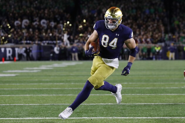 Notre Dame tight end Cole Kmet (84) runs after a catch for a touchdown against Southern California in the first half of an NCAA college football game in South Bend, Ind., Saturday, Oct. 12, 2019. (AP Photo/Paul Sancya)