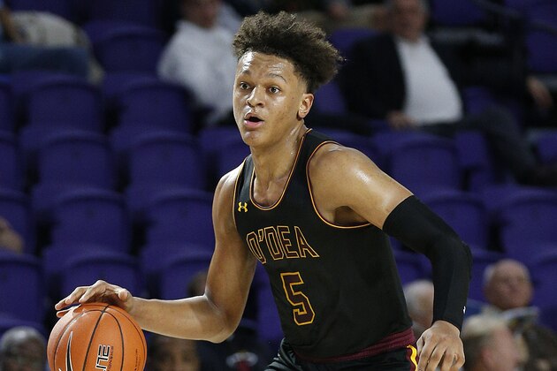 FORT MYERS, FLORIDA - DECEMBER 19:  Paolo Banchero #5 of O’Dea High School dribbles with the ball against Blanche Ely High School during the City of Palms Classic Day 2 at Suncoast Credit Union Arena on December 19, 2019 in Fort Myers, Florida. (Photo by Michael Reaves/Getty Images)