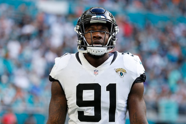 MIAMI, FL - DECEMBER 23:  Yannick Ngakoue #91 of the Jacksonville Jaguars looks on against the Miami Dolphins at Hard Rock Stadium on December 23, 2018 in Miami, Florida.  (Photo by Michael Reaves/Getty Images)