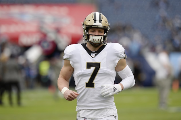 New Orleans Saints quarterback Taysom Hill warms up before an NFL football game against the Tennessee Titans Sunday, Dec. 22, 2019, in Nashville, Tenn. (AP Photo/Mark Zaleski)