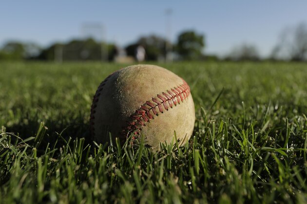 A baseball rests on the turf at Alamo Heights High School's baseball field in San Antonio, Tuesday, March 24, 2020. Because of COVID-19 outbreak, the school's season may be canceled. (AP Photo/Eric Gay) A baseball rests on the turf at Alamo Heights High School's baseball field in San Antonio, Tuesday, March 24, 2020. Because of COVID-19 outbreak, the school's season may be canceled. (AP Photo/Eric Gay)