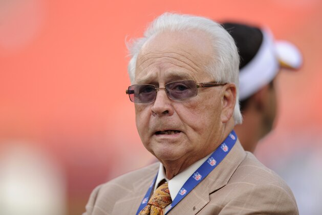 Dr. James Andrews, Washington Redskins quarterback Robert Griffin III's surgeon, stands on the field before an NFL football game against the Pittsburgh Steelers Monday, Aug. 19, 2013, in Landover, Md. The Redskins won 24-13. (AP Photo/Nick Wass)