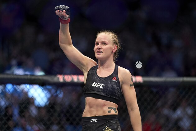 HOUSTON, TEXAS - FEBRUARY 08:  Valentina Shevchenko of Kyrgyzstan celebrates her TKO victory over Katlyn Chookagian in their women's flyweight championship bout during the UFC 247 event at Toyota Center on February 08, 2020 in Houston, Texas. (Photo by Cooper Neill/Zuffa LLC via Getty Images)