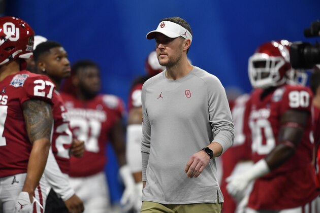Oklahoma head coach Lincoln Riley works before the first half of the Peach Bowl NCAA semifinal college football playoff game against LSU, Saturday, Dec. 28, 2019, in Atlanta. (AP Photo/John Amis)