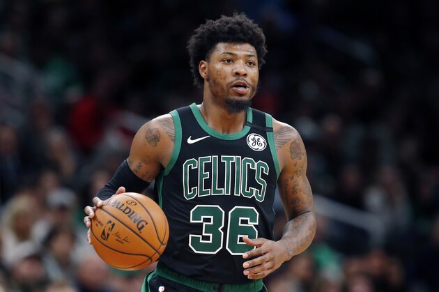 Boston Celtics' Marcus Smart plays against the Houston Rockets during an NBA basketball game in Boston, Saturday, Feb. 29, 2020. (AP Photo/Michael Dwyer)
