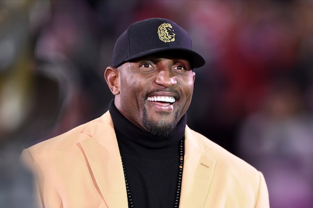 Former Baltimore Ravens linebacker Ray Lewis looks on during a halftime ceremony presenting former safety Ed Reed with his Pro Football Hall of Fame ring during an NFL football game between the Baltimore Ravens and the New England Patriots, Sunday, Nov. 3, 2019, in Baltimore. (AP Photo/Gail Burton)
