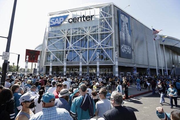 Fans walk outside of SAP Center at San Jose before Game 6 of the NHL hockey Stanley Cup Final series between the San Jose Sharks and the Pittsburgh Penguins in San Jose, Calif., Sunday, June 12, 2016. (AP Photo/Eric Risberg) Fans walk outside of SAP Center at San Jose before Game 6 of the NHL hockey Stanley Cup Final series between the San Jose Sharks and the Pittsburgh Penguins in San Jose, Calif., Sunday, June 12, 2016. (AP Photo/Eric Risberg)