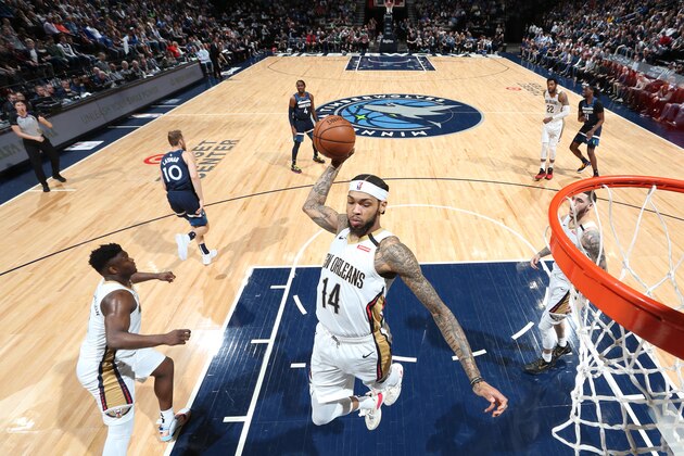 MINNEAPOLIS, MN -  MARCH 8: Brandon Ingram #14 of the New Orleans Pelicans grabs the rebound against the Minnesota Timberwolves on March 8, 2020 at Target Center in Minneapolis, Minnesota. NOTE TO USER: User expressly acknowledges and agrees that, by downloading and or using this Photograph, user is consenting to the terms and conditions of the Getty Images License Agreement. Mandatory Copyright Notice: Copyright 2020 NBAE (Photo by David Sherman/NBAE via Getty Images)