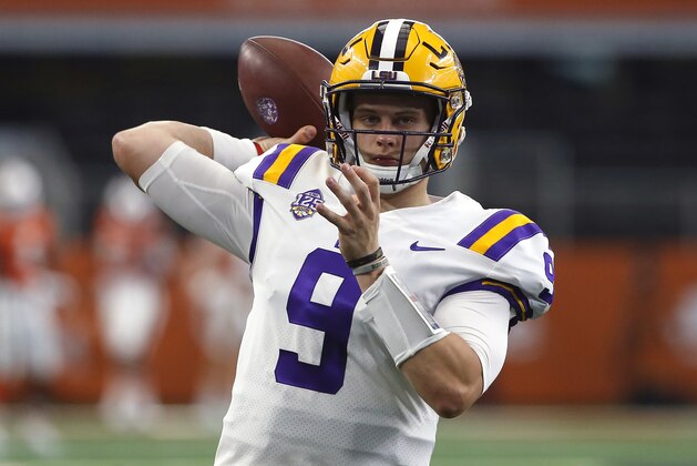 FILE - In this Sept. 2, 2018, file photo, LSU quarterback Joe Burrow (9) throws during warmups before playing Miami in an NCAA college football game, in Arlington, Texas. Burrow was not inclined to downplay inefficiencies in the passing game that, fortunately for the Tigers, were otherwise inconsequential in a lopsided, season-opening victory. “I made some bad throws. There were some drops,” Burrow said this week after reviewing a 33-17 rout of Miami that shot LSU up the AP Poll from 25th to 11th. LSU plays Southeastern Louisiana on Saturday night. (AP Photo/Ron Jenkins, File)
