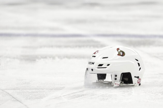 File-This Feb. 21, 2019, file photo shows the helmet belonging to Ottawa Senators left wing Zack Smith in the third period of an NHL hockey game against the New Jersey Devils, in Newark, N.J. The recent past, present and immediate future are all bleak for the Ottawa Senators. They’re on their way to missing the playoffs for the fourth time in six years, just sold off their top three forwards in trade-deadline fire sale and despite being dead-last in the NHL have no chance at a top-three pick in the draft because they included that in a deal last season. Gone in the past eight months are Erik Karlsson, Mike Hoffman, Mark Stone, Matt Duchene and Ryan Dzingel and what’s left is a void of uncertainty about just how long the Senators’ long-term rebuild will last. (AP Photo/Julio Cortez, File) File-This Feb. 21, 2019, file photo shows the helmet belonging to Ottawa Senators left wing Zack Smith in the third period of an NHL hockey game against the New Jersey Devils, in Newark, N.J. The recent past, present and immediate future are all bleak for the Ottawa Senators. They’re on their way to missing the playoffs for the fourth time in six years, just sold off their top three forwards in trade-deadline fire sale and despite being dead-last in the NHL have no chance at a top-three pick in the draft because they included that in a deal last season. Gone in the past eight months are Erik Karlsson, Mike Hoffman, Mark Stone, Matt Duchene and Ryan Dzingel and what’s left is a void of uncertainty about just how long the Senators’ long-term rebuild will last. (AP Photo/Julio Cortez, File)