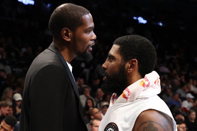 NEW YORK, NEW YORK - JANUARY 18: Kevin Durant #7 of the Brooklyn Nets talks to Kyrie Irving #11 of the Brooklyn Nets during their game against the Milwaukee Bucksat Barclays Center on January 18, 2020 in New York City. NOTE TO USER: User expressly acknowledges and agrees that, by downloading and/or using this photograph, user is consenting to the terms and conditions of the Getty Images License Agreement. (Photo by Al Bello/Getty Images) NEW YORK, NEW YORK - JANUARY 18: Kevin Durant #7 of the Brooklyn Nets talks to Kyrie Irving #11 of the Brooklyn Nets during their game against the Milwaukee Bucksat Barclays Center on January 18, 2020 in New York City. NOTE TO USER: User expressly acknowledges and agrees that, by downloading and/or using this photograph, user is consenting to the terms and conditions of the Getty Images License Agreement. (Photo by Al Bello/Getty Images)