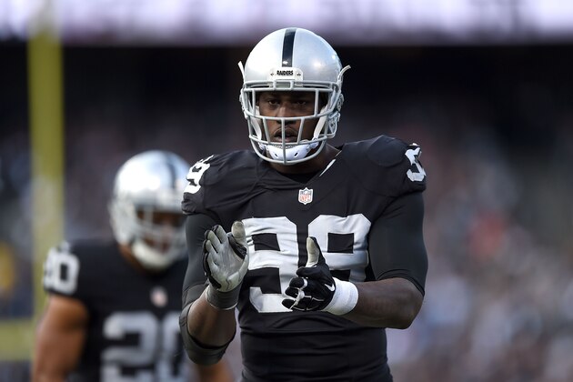 OAKLAND, CA - NOVEMBER 15:  Outside linebacker Aldon Smith #99 of the Oakland Raiders celebrates in the third quarter against the Minnesota Vikings at O.co Coliseum on November 15, 2015 in Oakland, California.  (Photo by Thearon W. Henderson/Getty Images)
