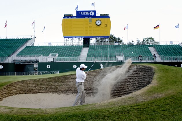Jason Knutzon from the U.S. plays out of the bunker on the 18th hole during a practice round at  Royal St. George's Golf Club, Sandwich, England, Sunday, July, 10, 2011.  The British Open Golf Championship will be held at the course from July 14-17th 2011.  (AP Photo/Peter Morrison)