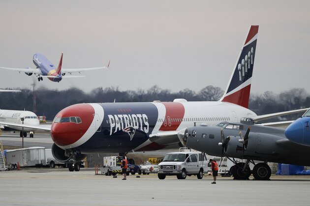 The plane carrying the New England Patriots arrives at the Hartsfield-Jackson Atlanta International Airport for the NFL Super Bowl 53 football game Sunday, Jan. 27, 2019, in Atlanta. (AP Photo/David J. Phillip)