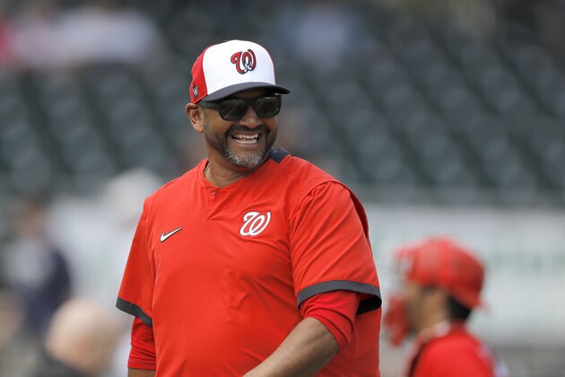 Washington Nationals manager Dave Martinez reacts while walking back to the dugout after pulling starting pitcher pitcher Ben Braymer during the third inning of a spring training baseball game against the Miami Marlins, Tuesday, March 10, 2020, in Jupiter, Fla. (AP Photo/Julio Cortez)