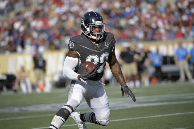 AFC running back Derrick Henry (22), of the Tennessee Titans, runs after catching a pass during the first half of the NFL Pro Bowl football game against the NFC Sunday, Jan. 26, 2020 in Orlando, Fla. (AP Photo/Phelan M. Ebenhack)