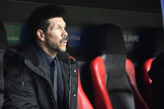 Atletico Madrid coach Diego Simeone waits for the start of the Champions League, Group D, soccer match between Leverkusen and Atletico Madrid at the BayArena in Leverkusen, Germany, Wednesday, Nov. 6, 2019. (AP Photo/Martin Meissner)