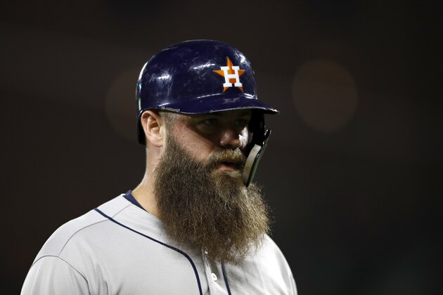 Houston Astros' Evan Gattis walks on the field in the second baseball game of a doubleheader against the Baltimore Orioles, Saturday, Sept. 29, 2018, in Baltimore. (AP Photo/Patrick Semansky)