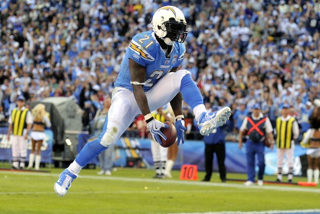 FILE - In this Nov. 29, 2009, file photo, San Diego Chargers running back LaDainian Tomlinson celebrates his second touchdown during the third quarter of an NFL football game against the Kansas City Chiefs, in San Diego, Calif. Tomlinson is a candidate for the Pro Football Hall of Fame.  (AP Photo/Chris Carlson, File)