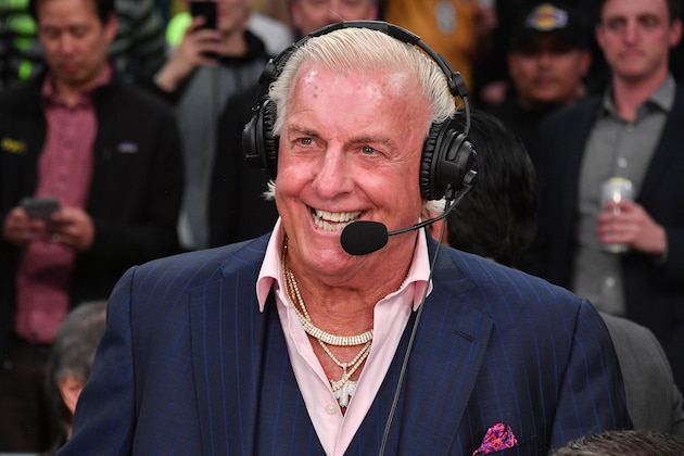 LOS ANGELES, CALIFORNIA - FEBRUARY 25: Ric Flair joins a telecast during a basketball game between the Los Angeles Lakers and the New Orleans Pelicans at Staples Center on February 25, 2020 in Los Angeles, California. (Photo by Allen Berezovsky/Getty Images)