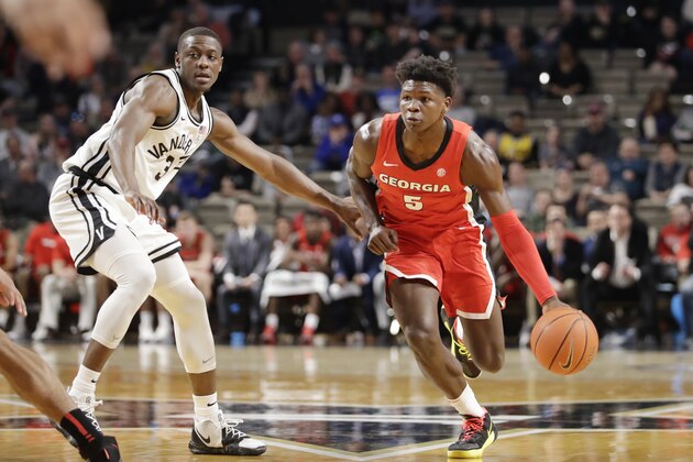 Georgia guard Anthony Edwards (5) drives against Vanderbilt guard Maxwell Evans (3) in the first half of an NCAA college basketball game Saturday, Feb. 22, 2020, in Nashville, Tenn. (AP Photo/Mark Humphrey)