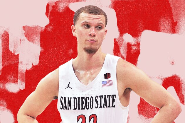 San Diego State forward Matt Mitchell (11), right, and Nolan Narain (12) celebrate during the first half of an NCAA college basketball game against Colorado State Tuesday, Feb. 25, 2020, in San Diego. (AP Photo/Denis Poroy)
