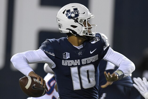 Utah State quarterback Jordan Love (10) throws the ball against Boise State during the first half of an NCAA college football game Saturday, Nov. 23, 2019, in Logan, Utah. (AP Photo/Eli Lucero)
