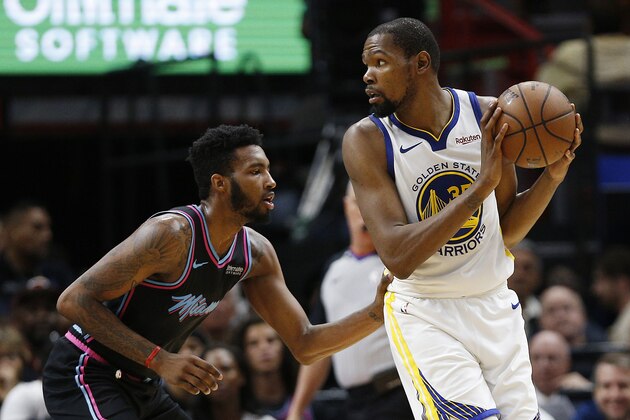 MIAMI, FLORIDA - FEBRUARY 27: Kevin Durant #35 of the Golden State Warriors is defended by Derrick Jones Jr. #5 of the Miami Heat at American Airlines Arena on February 27, 2019 in Miami, Florida. NOTE TO USER: User expressly acknowledges and agrees that, by downloading and or using this photograph, User is consenting to the terms and conditions of the Getty Images License Agreement. (Photo by Michael Reaves/Getty Images) MIAMI, FLORIDA - FEBRUARY 27: Kevin Durant #35 of the Golden State Warriors is defended by Derrick Jones Jr. #5 of the Miami Heat at American Airlines Arena on February 27, 2019 in Miami, Florida. NOTE TO USER: User expressly acknowledges and agrees that, by downloading and or using this photograph, User is consenting to the terms and conditions of the Getty Images License Agreement. (Photo by Michael Reaves/Getty Images)