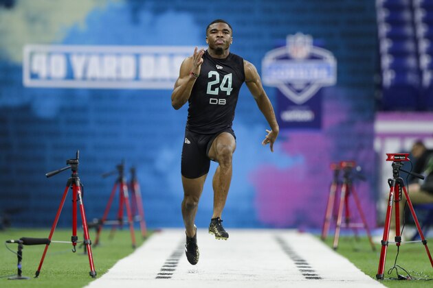 Ohio State defensive back Jeff Okudah runs the 40-yard dash at the NFL football scouting combine in Indianapolis, Sunday, March 1, 2020. (AP Photo/Michael Conroy)