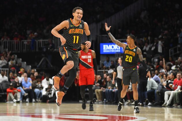 Atlanta Hawks guard Trae Young (11) reacts after a long range assist during the second half of an NBA basketball game against thePortland Trail Blazers, Saturday, Feb. 29, 2020, in Atlanta. (AP Photo/John Amis) Atlanta Hawks guard Trae Young (11) reacts after a long range assist during the second half of an NBA basketball game against thePortland Trail Blazers, Saturday, Feb. 29, 2020, in Atlanta. (AP Photo/John Amis)