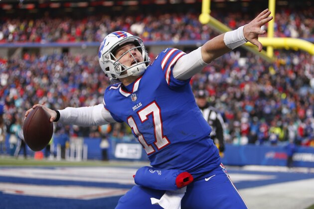 Buffalo Bills quarterback Josh Allen (17) celebrates his touchdown during the second half of an NFL football game against the Miami Dolphins, Sunday, Dec. 30, 2018, in Orchard Park, N.Y. (AP Photo/Jeffrey T. Barnes)