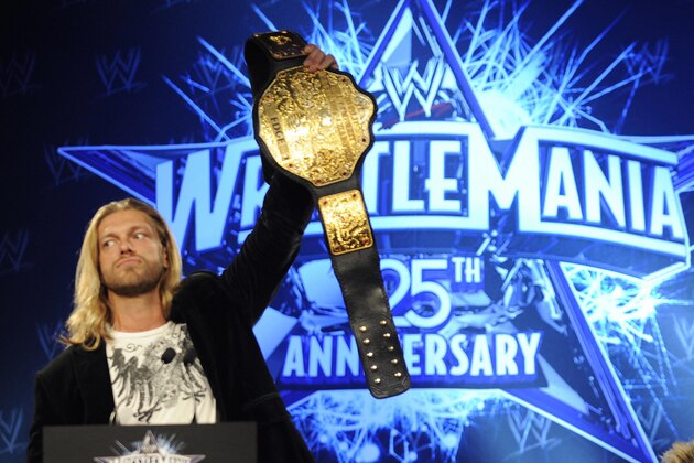 WWE (World Wrestling Entertainment) World Heavyweight Champion Edge and Chris Jericho (R)  during a press conference in New York March 31, 2009 to promote the 25th Anniversary of WrestleMania to take place at Reliant Stadium in Houston, Texas on April 5th.  AFP PHOTO/ TIMOTHY A. CLARY (Photo credit should read TIMOTHY A. CLARY/AFP via Getty Images)