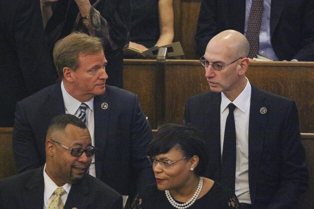 NFL Commissioner Roger Goodell and NBA Commissioner Adam Silver in attendance at the funeral service for NFL New Orleans Saints owner and NBA New Orleans Pelicans owner Tom Benson in New Orleans, Friday, March 23, 2018. Benson died last Thursday at the age of 90. (AP Photo/Derick Hingle)