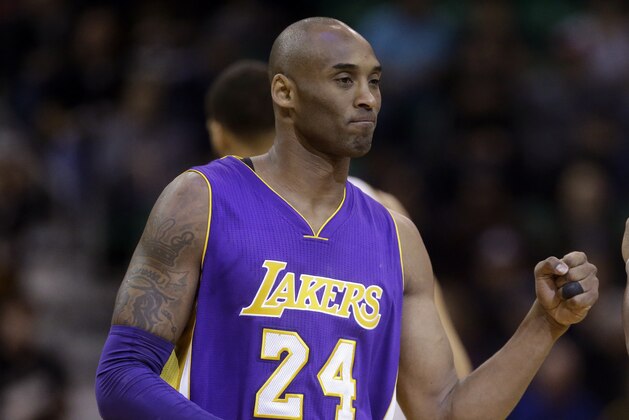 FILE - In this March 28, 2016, file photo, Los Angeles Lakers forward Kobe Bryant (24) walks onto the court during the team's NBA basketball game against the Utah Jazz in Salt Lake City. The Lakers announced Tuesday, Sept. 12, 2017, that they will retire Bryant’s No. 8 and No. 24 in a ceremony Dec. 18 during their game against Golden State. Bryant wore No. 8 from 1996 to 2006, when he switched to No. 24 for the remainder of his 20-year career with the Lakers. He will be the 10th player honored by the Lakers with a jersey retirement, and the first to have two retired numbers. (AP Photo/Rick Bowmer, File)