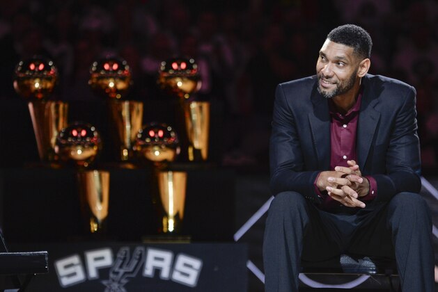 San Antonio Spurs' Tim Duncan listens while special guests speak about him during his jersey retirement ceremony, Sunday, Dec. 18, 2016, in San Antonio. (AP Photo/Darren Abate)