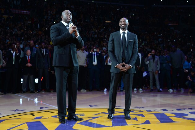 LOS ANGELES, CA - DECEMBER 18: Magic Johnson addresses the crowd during Kobe Bryant's jersey retirement ceremony on December 18, 2017 at STAPLES Center in Los Angeles, California. NOTE TO USER: User expressly acknowledges and agrees that, by downloading and/or using this Photograph, user is consenting to the terms and conditions of the Getty Images License Agreement. Mandatory Copyright Notice: Copyright 2017 NBAE (Photo by Andrew D. Bernstein/NBAE via Getty Images)