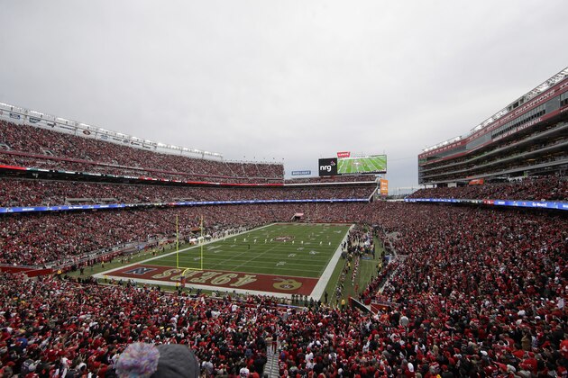 FILE - In this Jan. 19, 2020, file photo, fans at Levi's Stadium watch as the Green Bay Packers kickoff to the San Francisco 49ers during the first half of the NFL NFC Championship football game in Santa Clara, Calif. At a time when America is trying to cope with the financial fallout created by the deadly coronavirus, the renewal of NFL season tickets is not exactly a high priority in the midst of soaring unemployment, business closures and a volatile stock market. Most teams understand this, and have acted accordingly. (AP Photo/Jeff Chiu, File) FILE - In this Jan. 19, 2020, file photo, fans at Levi's Stadium watch as the Green Bay Packers kickoff to the San Francisco 49ers during the first half of the NFL NFC Championship football game in Santa Clara, Calif. At a time when America is trying to cope with the financial fallout created by the deadly coronavirus, the renewal of NFL season tickets is not exactly a high priority in the midst of soaring unemployment, business closures and a volatile stock market. Most teams understand this, and have acted accordingly. (AP Photo/Jeff Chiu, File)