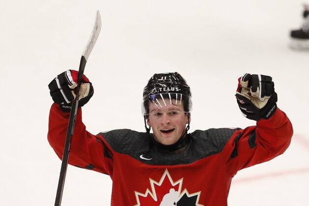Canada's Alexis Lafreniere celebrates his sides first goal during the U20 Ice Hockey Worlds match between Canada and the United States in Ostrava, Czech Republic, Thursday, Dec. 26, 2019. (AP Photo/Petr David Josek)