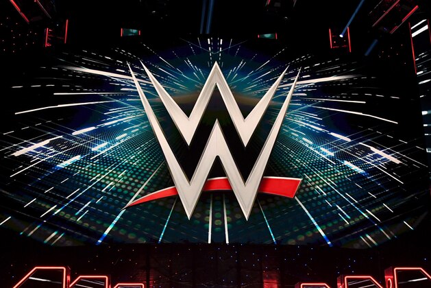 LAS VEGAS, NEVADA - OCTOBER 11:  WWE logos are shown on screens before a WWE news conference at T-Mobile Arena on October 11, 2019 in Las Vegas, Nevada. It was announced that WWE wrestler Braun Strowman will face heavyweight boxer Tyson Fury and WWE champion Brock Lesnar will take on former UFC heavyweight champion Cain Velasquez at the WWE's Crown Jewel event at Fahd International Stadium in Riyadh, Saudi Arabia on October 31.  (Photo by Ethan Miller/Getty Images)