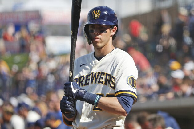 Milwaukee Brewers' Christian Yelich in the batting circle during a spring training baseball game against the Los Angeles Angels, Sunday, March 8, 2020, in Phoenix, Ariz. (AP Photo/Sue Ogrocki) Milwaukee Brewers' Christian Yelich in the batting circle during a spring training baseball game against the Los Angeles Angels, Sunday, March 8, 2020, in Phoenix, Ariz. (AP Photo/Sue Ogrocki)