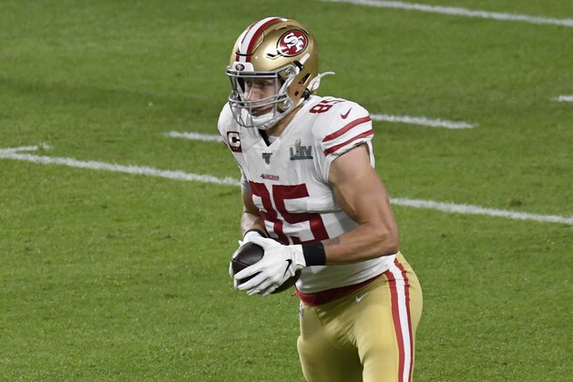 MIAMI, FLORIDA - FEBRUARY 02: George Kittle #85 of the San Francisco 49ers runs with the ball after catching a pass against the Kansas City Chiefs in Super Bowl LIV at Hard Rock Stadium on February 02, 2020 in Miami, Florida. The Chiefs won the game 31-20. (Photo by Focus on Sport/Getty Images)