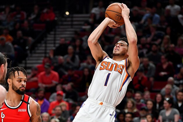 PORTLAND, OREGON - MARCH 10: Devin Booker #1 of the Phoenix Suns shoots a fadeaway jumper during the first half of the game against the Portland Trail Blazers at the Moda Center on March 10, 2020 in Portland, Oregon. The Portland Trail Blazers topped the Phoenix Suns, 121-105. NOTE TO USER: User expressly acknowledges and agrees that, by downloading and or using this photograph, User is consenting to the terms and conditions of the Getty Images License Agreement. (Photo by Alika Jenner/Getty Images) PORTLAND, OREGON - MARCH 10: Devin Booker #1 of the Phoenix Suns shoots a fadeaway jumper during the first half of the game against the Portland Trail Blazers at the Moda Center on March 10, 2020 in Portland, Oregon. The Portland Trail Blazers topped the Phoenix Suns, 121-105. NOTE TO USER: User expressly acknowledges and agrees that, by downloading and or using this photograph, User is consenting to the terms and conditions of the Getty Images License Agreement. (Photo by Alika Jenner/Getty Images)