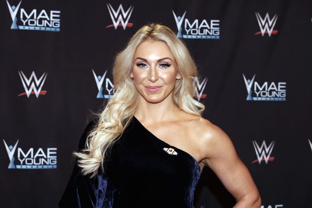 IMAGE DISTRIBUTED FOR WWE - WWE Superstar Charlotte Flair celebrates the Mae Young Classic at the Thomas & Mack Center on Tuesday, Sept. 12, 2017, in Las Vegas. (Bizuayehu Tesfaye/AP Images for WWE)