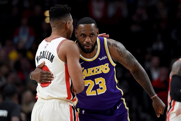 PORTLAND, OREGON - DECEMBER 06: LeBron James #23 of the Los Angeles Lakers greets CJ McCollum #3 of the Portland Trail Blazers before the game at Moda Center on December 06, 2019 in Portland, Oregon. NOTE TO USER: User expressly acknowledges and agrees that, by downloading and or using this photograph, User is consenting to the terms and conditions of the Getty Images License Agreement. (Photo by Steve Dykes/Getty Images)