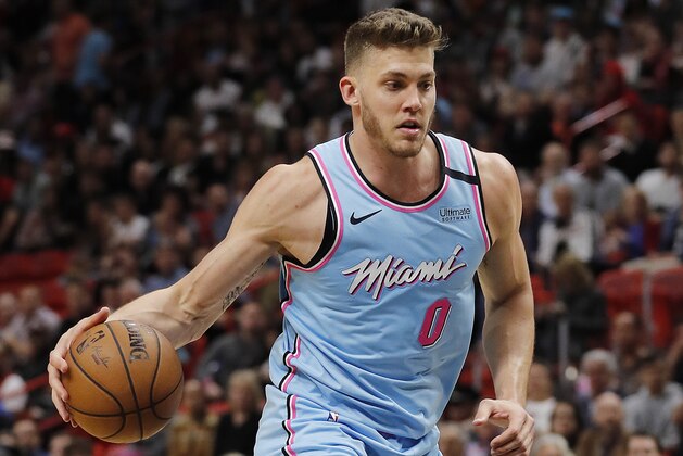 MIAMI, FLORIDA - FEBRUARY 03:  Meyers Leonard #0 of the Miami Heat in action against the Philadelphia 76ers during the second half at American Airlines Arena on February 03, 2020 in Miami, Florida. NOTE TO USER: User expressly acknowledges and agrees that, by downloading and/or using this photograph, user is consenting to the terms and conditions of the Getty Images License Agreement.  (Photo by Michael Reaves/Getty Images)